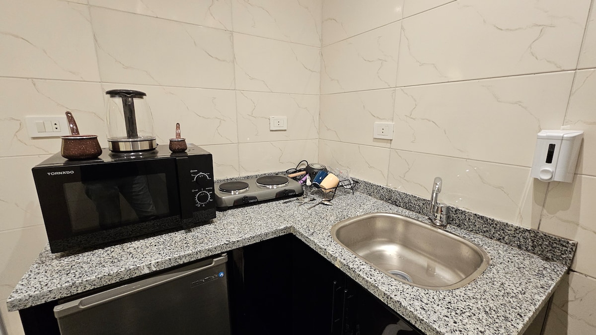 B601 · 1BR Apartment in Downtown Cairo Qasr El Nil B601 — Kitchenette, photo 1