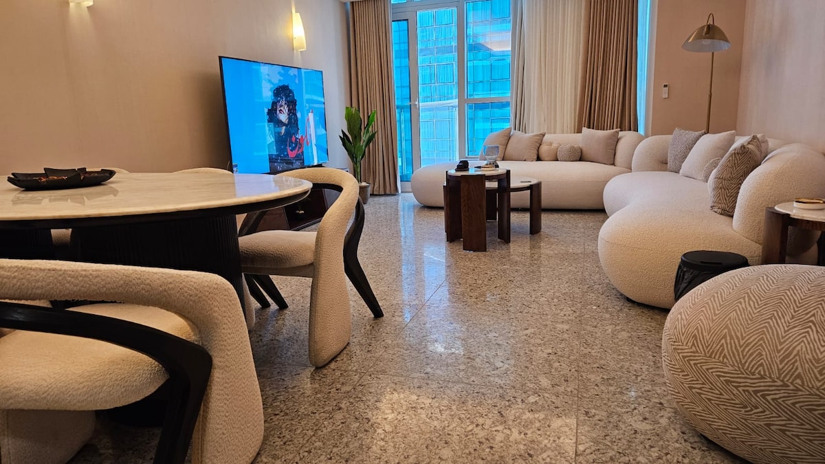 Hilton Maadi apartment living room with curved sofas